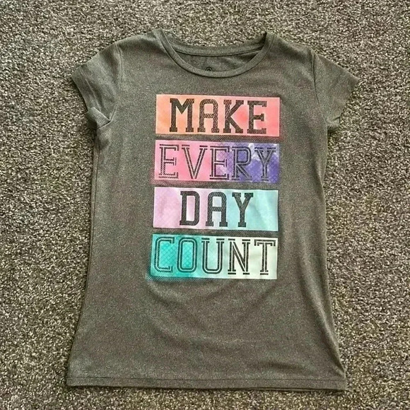 Champion Other - Girls, champion T-shirt. Size L 10/12